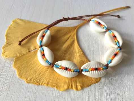 How To Make A Cowrie Shell Bracelet, Cowrie Shell Bracelet, Cowrie Shell Beaded Bracelets For The Beach, Summer Beachy Cowrie Shell Bracelets, Beachy Cowrie Shell Bracelet For Beach, Handmade Beachy Cowrie Shell Bracelet, Bohemian Beaded Cowrie Shell Bracelet, Cowrie Shell Jewelry, Small Bead Bracelet