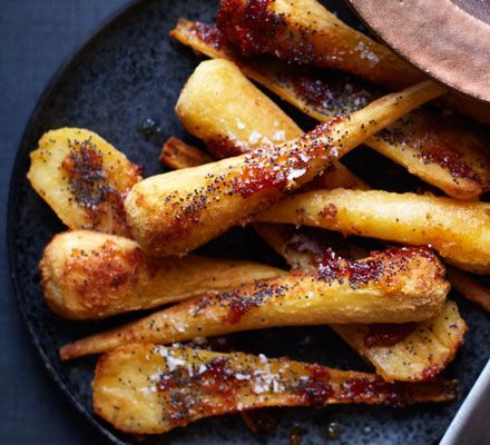 These golden, honeyed parsnips have just the right mix of earthiness and sweet glaze to make a moreish Christmas side dish, and they’re quick to prepare Honey Parsnips, Honey Roasted Parsnips, Parsnip Recipes, Roasted Parsnips, Christmas Side, Sweet Glaze, Christmas Side Dishes, Xmas Dinner, Roast Dinner