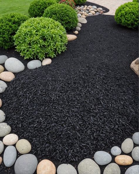 20 Elegant Black Mulch Landscaping Designs To Copy - Toolz Geek Black Mulch Landscaping Ideas Front Yard, Black Lava Rocks Landscaping, Black Mulch Landscaping, Shrubs For Landscaping, Lovely Landscapes, Landscaping Around House, Florida Garden, Mulch Landscaping, Small Yard Landscaping