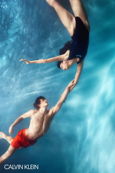 Conor Fay in the Intense Power Medium Drawstring Swim Shorts and Malika Elmaslouhi in the Intense Power Scoop Neck Swimsuit. By Charlotte Wales. #MYCALVINS Swimming Body, Charlotte Wales, Male Swimmers, Swimming Photography, Swim Model, Mermaid Photography, Quick Dip, Reference Photos For Artists, Pool Art