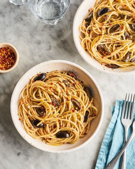 You probably already have (most) of the ingredients to make this! Olive Spaghetti, Holiday Pasta, Baked Scallops, Lobster Bisque, Seafood Market, Pasta Dish, Peanut Free, Anchovies, Meat Free