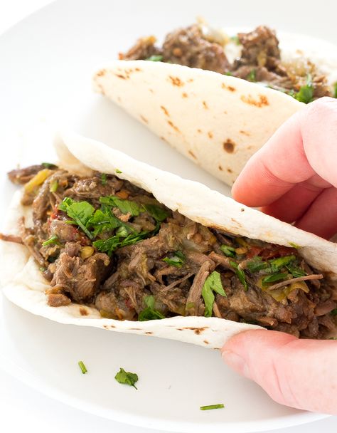 This Instant Pot Barbacoa Beef recipe is perfect for busy weeknights or your next Taco Tuesday. Plus, only 15 minutes of prep time! Beef Tacos Instant Pot, How To Make Barbacoa, Instant Pot Barbacoa Beef, Green Chile Beef, Beef In The Instant Pot, Instant Pot Barbacoa, Tacos Instant Pot, Street Taco, Barbacoa Beef