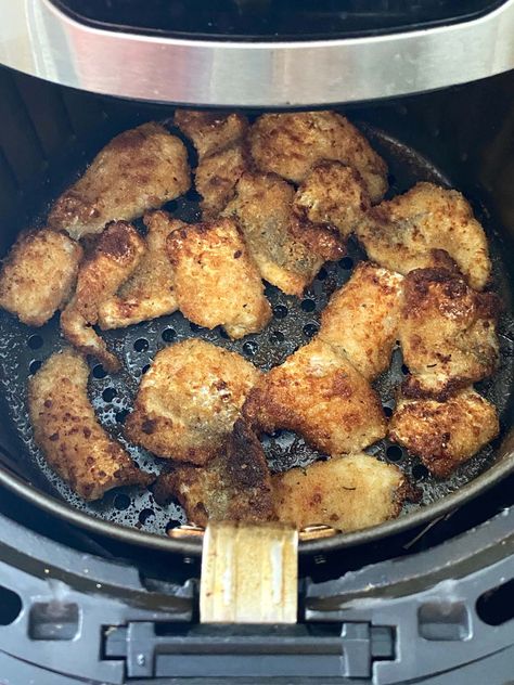 These Air Fryer Catfish Nuggets are soft and delicious on the inside and perfectly crispy on the outside! Use regular breadcrumbs or even almond flour to make these easy nuggets. Catfish Nuggets in the Air Fryer Don't you love easy recipes using the air fryer? It has become our favorite appliance for quickly cooking everything from chicken tenders to pancakes, without added oil. And it's great for making kid-friendly meals and appetizers. We love to serve these catfish nuggets with chopped ... Airfryer Catfish Recipe, Air Fryer Catfish Nuggets, Catfish Nuggets Recipes, Fried Catfish Nuggets, How To Cook Catfish, Air Fryer Catfish, Airfryer Meals, Catfish Nuggets, Baked Catfish