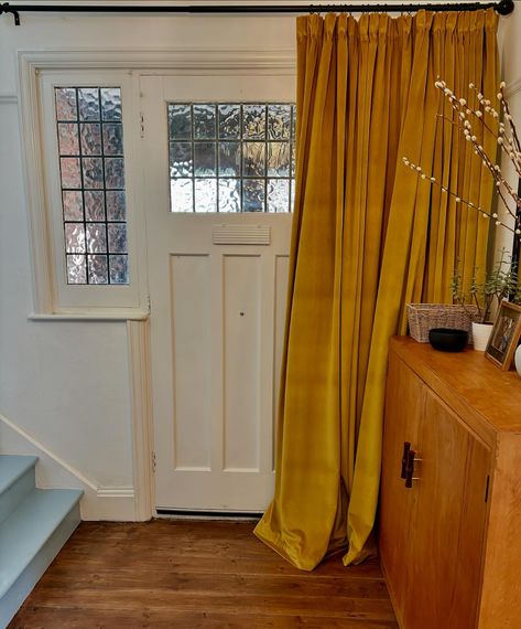 As the cooler months approach, I’m a big fan of a cosy door curtain to keep the warmth in. This one provides a pop of rich colour to what could have been a gloomy space. 📷: @stephcookinteriors #curtains #doorcurtain Curtains Over Front Door, Fromt Doors, Tranquil Spaces, What Could Have Been, Doorway Curtain, School House, Door Curtain, Peaceful Places, Door Curtains