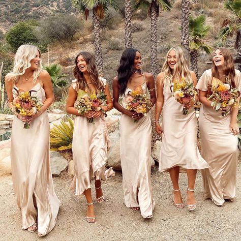 You may be the star on your big day, but don’t forget about the gorgeous ladies standing beside you. And what better way to have your closest friends shine, than by donning them the most standout color: Gold. Toss out any rulebook that says a bride's entourage must be understated, because the best way to ensure that you shine the brightest is with ... Gold Satin Bridesmaid Dresses, Gold Bridesmaids Dresses, Mumu Wedding, Storybook Wedding, Champagne Bridesmaid Dresses, Champagne Bridesmaid, Gold Bridesmaid Dresses, Gold Bridesmaids, Affordable Bridesmaid Dresses