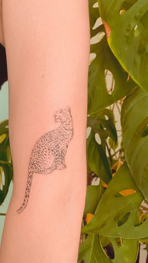 Bobcat Tattoos For Women, Cheetah Outline Tattoo, Leopard Face Tattoo For Women, Snow Leopard Tattoo Women, Small Cheetah Tattoo For Women, Fine Line Cheetah Tattoo, Small Cheetah Tattoo, Leopard Symbolism, Leopard Tattoo Design For Women