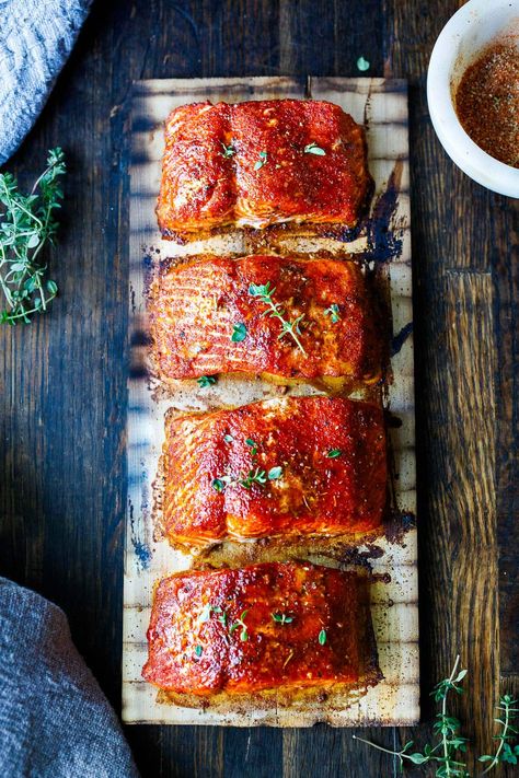 This recipe for Cedar Plank Salmon couldn't be any easier! Infuse wild salmon with subtle smoke and our flavorful Northwest Salmon Rub, using a cedar plank on the grill. No fuss with easy clean up. Salmon Calories, Salmon Rub, Cooking Salmon Fillet, Diy Seasonings, Best Salmon Recipe, Meatless Mains, Feasting At Home, Delicious Salmon Recipes, Plank Salmon