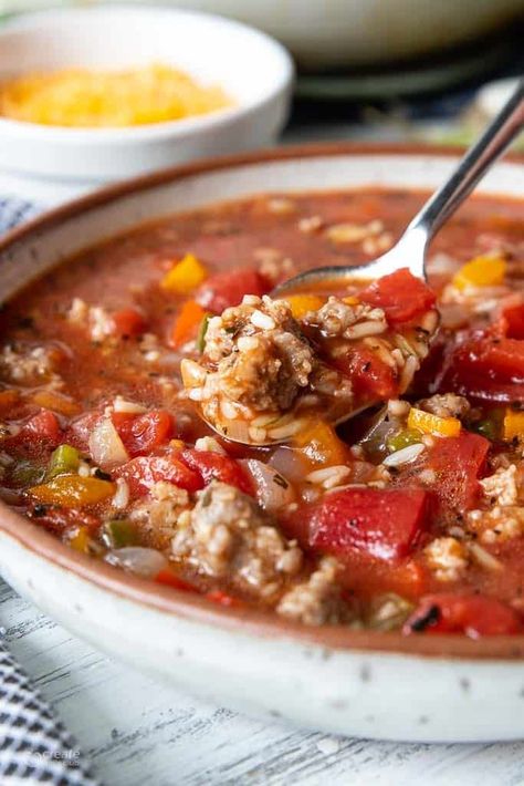 Stuffed pepper soup with sausage is a flavor-packed 20-minute meal made with sausage, peppers, and rice. Gluten-free. Sausage Peppers And Rice, Peppers And Rice, Soup With Sausage, Sausage Soup Recipes, Sausage Peppers, Friends Recipes, Sauteed Peppers, Italian Sausage Soup, Stuffed Pepper