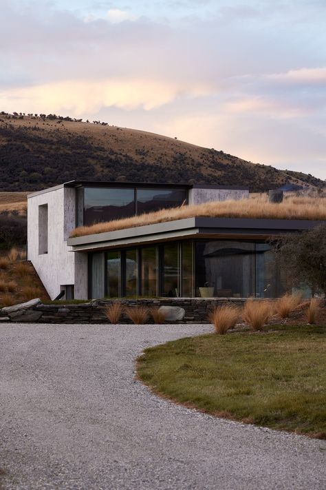 Walls of Glass at This New Zealand Home Capture the Most Epic Mountain Views - Dwell New Zealand Home, Concrete Siding, Modern Glass House, Modern Agriculture, Landscape Lighting Design, Earth Sheltered, Timber Roof, New Zealand Houses, Metal Siding