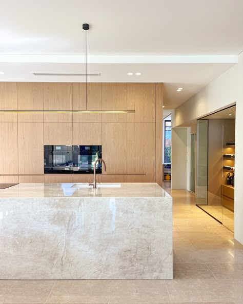 Some beautiful kitchen inspo right here by @piteoarchitects & #UniqStone The beauty of the Taj Mahal is breathtaking, being the main element in this gorgeous design. What else stands out to you in this kitchen? We are in love with the lighting and the boxed island 🤍 #adelaidehomes #interiordesign #architecture #kitchendesign #stonebenchtops #benchtopsadelaide #adelaidebenchtops #kitcheninspo #homedesign #buildersadelaide Taj Mahal Modern Kitchen, Taj Mahal Quartzite Kitchen Island, Taj Mahal Kitchen Island, Kitchen Taj Mahal Quartzite, Taj Mahal Quartz, Marble Island Kitchen, Stone Kitchen Ideas, Dubai Townhouse, Stone Benchtop Kitchen