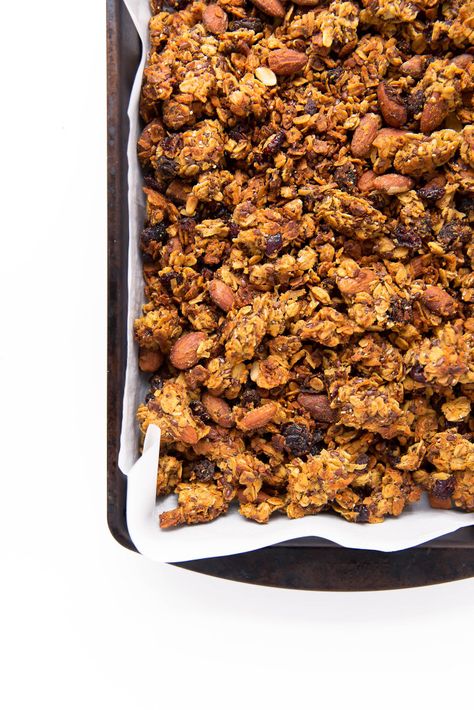 Packed with carrots, coconut, cinnamon, and raisins, this Carrot Cake Granola takes breakfast up a notch. Gluten free, refined sugar free, and loaded with ingredients that will keep you full all morning long. Carrot Cake Granola, Butter Carrots, Carrot Spice Cake, Broma Bakery, Spiced Carrots, Granola Recipes, Homemade Granola, Roasted Almonds, Slow Food