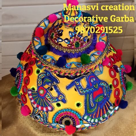 Exclusive work by Manasvi Creation Navratri special Decorative Garba Work Only Pre booking DM for more details. Manoj patel-9870291525 Jyoti patel-9773727317 Follow my page #manasvicreations #traditionalgarba #garba #decorativegarba #garbawork #handmade #diygarba #navratri #navratrigarba #theamgarba #designergarba #exclusiveart #decorativeart #customize #decoration #ecofreindly #ghatkopargarba #jayambe #jaybhavani #localforvocal Navratri Matki Decoration, Garba Matki Decoration, Garbo Decoration Navratri, Garba Decoration Ideas Navratri, Navratri Garba Decoration, Garba Decoration Ideas At Home, Navaratri Decoration, Garba Decoration Ideas, Indian Handicrafts Decor