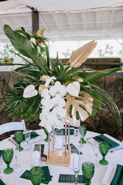 White Phalaenopsis Orchid, White Anthurium, Tropical Greenery, Gold Monstera Leaves White Green Gold Tropical Party, Monstera Leaf Party Theme, Green And Gold Tropical Wedding, Monstera Leaf Wedding Decor, Monstera Wedding Centerpieces, Safari Themed Wedding, Monstera Arrangement, Tropical Centrepiece, Monstera Centerpiece