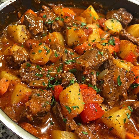 🍲🇩🇪 Savor the warmth of our German Goulash – hearty and delicious! #GermanCuisine #ComfortFood German Goulash Ingredients: Beef stew meat (2 lbs) Onions (2, sliced) Garlic (3 cloves, minced) Paprika (2 tbsp) Tomato paste (2 tbsp) Beef broth (4 cups) Red bell peppers (2, chopped) Carrots (2, sliced) Potatoes (3, cubed) Caraway seeds (1 tsp) Salt and pepper (to taste) Instructions: Brown beef in a large pot; remove. Sauté onions and garlic until soft. Stir in paprika and tomato paste; cook ... Goulash Aesthetic, German Stew, Tomato Beef Stew, German Goulash, Sauté Onions, Food Reference, Carrots Potatoes, Instagram Recipes, Red Bell Peppers