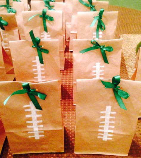 Football theme goody bags Football Goody Bags, Treat Bag Ideas, Cheer Snacks, Goody Bag Ideas, Football Favors, New York Deli, Football Treats, Football Player Gifts, Football Team Gifts