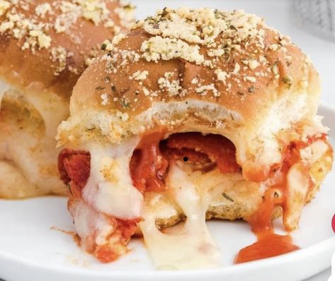 Pizza Sliders
￼

Pizza Sliders are quick and easy-to-make at home and perfectly portioned for small-sized snacking. Soft bread is stuffed with cheese, sauce, and pepperoni, brushed with butter, and baked into delicious game day or anytime appetizers.

Prep Time
10 mins
Cook Time
25 mins
Total Time
35 mins

Course: Appetizer, DinnerCuisine: AmericanKeyword: Game Day Food, pizza, pizza sliders, tailgate Servings: 12 sliders Calories: 229kcal Author: Jennifer Fishkind
Ingredients
	•	12 count package Hawaiian rolls
	•	2½ cup shredded mozzarella divided 1 cup and 1 ¼ cup
	•	¾ cup pizza sauce
	•	20 slices deli style dry cured pepperoni
	•	⅓ cup salted sweet cream butter melted
	•	2 tbsp grated parmesan
	•	1  teaspoon dried Italian seasoning
Instructions
	•	Preheat the oven to 375*.  Lightly spra Jennifer Fishkind, Sliders Pizza, Sweet Cream Butter, Pizza Sliders, Pizza Slider, Soft Bread, Deli Style, Cream Butter, Food Pizza