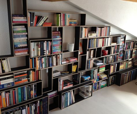 I wanted to build a good-looking and practical bookshelf for our new apartement. Since the apartement is on the top floor, the ceiling is angular and ... Homemade Bookshelves, Diy Bookshelf Plans, Modular Bookshelf, Home Library Design Ideas, Contemporary Bookshelf, Modular Bookshelves, Black Bookshelf, Unique Bookcase, Simple Bookshelf