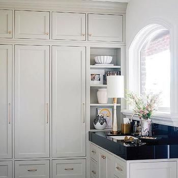 Light Gray Pantry Cabinets with Black Soapstone Countertops and Backsplash - Transitional - Kitchen Soapstone Countertops And Backsplash, Floor To Ceiling Pantry Cabinets, Soapstone Backsplash, Black Soapstone Countertops, Floor To Ceiling Pantry, Blue Wall Color, White Brick Backsplash, Shelves Design Ideas, Interior Design Yellow