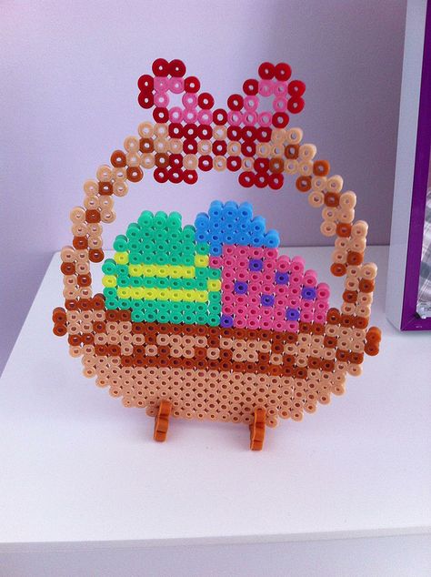 Easter basket hama perler beads by shakotte Easter Hama Beads, Easter Cross Stitch, Pearl Beads Pattern, Fuse Bead Patterns, Art Perle, Hama Beads Design, Diy Perler Bead Crafts, Perler Bead Templates, Perler Crafts