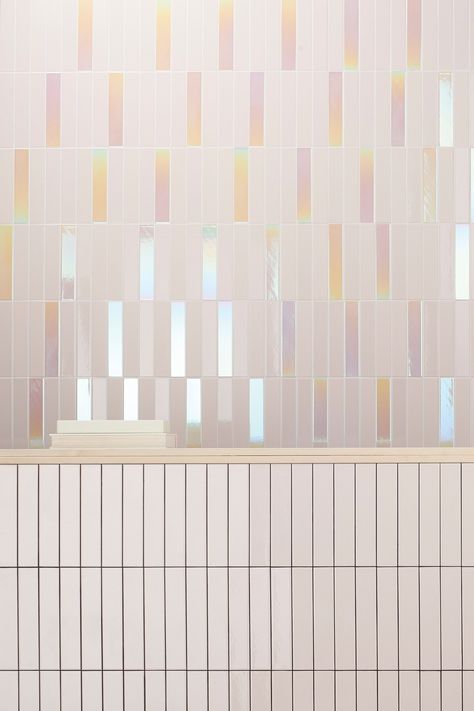 Introducing Glow, a mesmerizing tile series exploring light reactions on different glazes. With a holographic finish that shifts colors, it comes in four shades, each in matte and glossy. The mix includes a holographic option, enhancing contemporary spaces. #TileInspiration #ValentinesInterior #TileDesign #ValentinesPalette #TileLove #InteriorDesign #HomeDecor #InteriorInspiration #DecorInspiration #InteriorStyling #HomeDesign #InteriorDecorating #DesignInspiration Holographic Tiles Bathroom, Rainbow Bathroom Tile, Iridescent Bathroom Ideas, Iridescent Bathroom Tiles, Ombre Backsplash, Holographic Tiles, Iridescent Subway Tile, Iridescent Tile Bathroom, Iridescent Bathroom