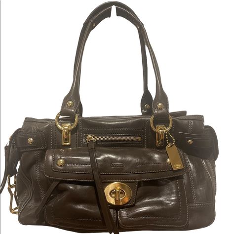 Coach Hampton Lindsay Satchel This Beautiful Vintage Coach Espresso Satchel Has Been Stored In The Dust Bag. 100% Authentic With Tags Still Attached. A Front Flap With Imposing Brass Turn Lock Conceals Two Smaller Front Pockets. The Left Pocket Has A Zipper To It, Which Was Probably Conceived As A Coin Pocket. Another Zippered Pocket In Front Can Be Found In Between The Brass Eyelets. Brass Hardware All Over, With Impressive Snap Ring And Eyelets. The Back Of The Bag Has An Outer Zippered Pocket Access Granted, Angelic Beauty, Magic Bag, Coach Satchel, Digital Closet, Snap Ring, Leather Saddle Bags, Pretty Bags, Vintage Coach