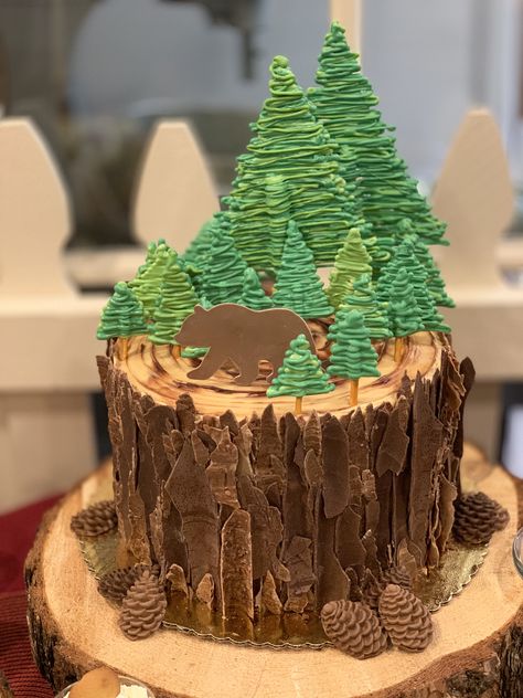 Bear inspired chocolate peanut butter pine tree round cake, adorned with chocolate bark, edible pine cones, Bear and pine trees! #pinecones #pinecake #bearcake #cake #kendrascountrybakery Frosting Trees On Cake, Edible Pine Trees For Cake, Chocolate Tree Bark, Chocolate Bark Cake, Nursing Cake, Chocolate Tree, Christmas Cake Decorations, Tree Cake, Forest Cake