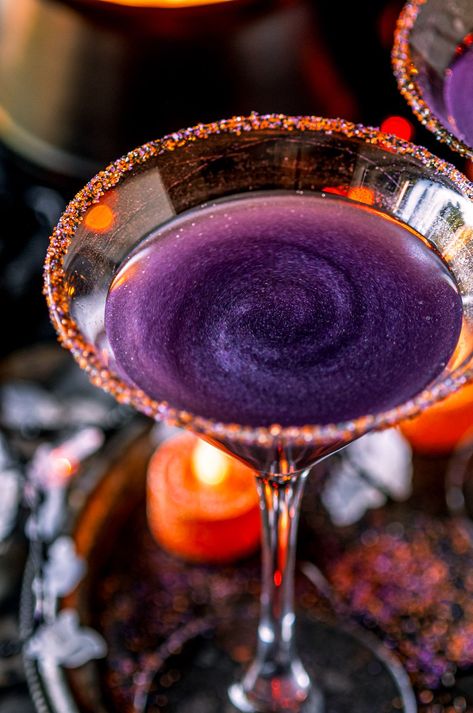 Prepare for a bewitching night with this spellbinding purple Halloween hocus pocus cocktail. Crafted with gin and Creme de Violette liqueur, this enchanting concoction is the perfect drink for any spooky October get together! From aberdeenskitchen.com #halloween #hocus #pocus #cocktail #purple #gin #cremedeviolette #liqueur #happyhour #festive #spooky #recipe Purple Gin Drink, Purple Gin Cocktail, Halloween Gin Cocktails, Purple Gin, Spooky Cocktails, Red Food Dye, Purple Cocktails, Spooky October, Infused Gin