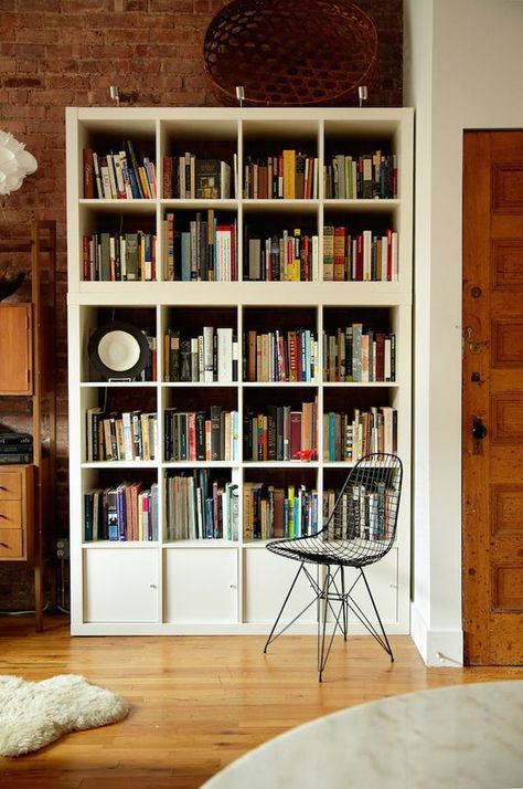 The IKEA Expedit (lately reborn as the Kallax) has, like a lot of classics, an incredibly simple design. And like a lot of IKEA pieces, it lends itself to all kinds of different uses—some of which you may have not even thought of. Here are 15 different ways to put your Kallax bookcase to work all over the house, in many storage solutions. Kallax Bookshelf, Ikea Kallax Bookshelf, Ikea 2015, Ikea Kallax Shelf, Ikea Bookcase, Ikea Expedit, Kallax Shelf, Ikea Bookshelves, Ikea Living Room