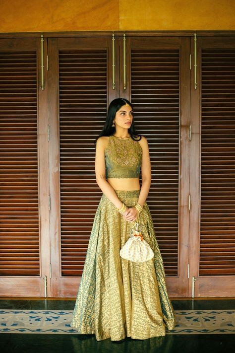 Simple and elegant olive green lehenga with a crop top for pre wedding functions | WedMeGood| Gautam & Mansha| #wedmegood #indianweddings #lehenga #croptop #olivegreen #prewedding Lehenga Simple Elegant, Simple Crop Top Lehenga, Crop Tops For Lehenga, Lehenga Blouse Designs Crop Tops, Crop Top Lehenga Wedding, Olive Green Lehenga, Lehenga Top, Crop Top Wedding Dress, Mehendi Outfit