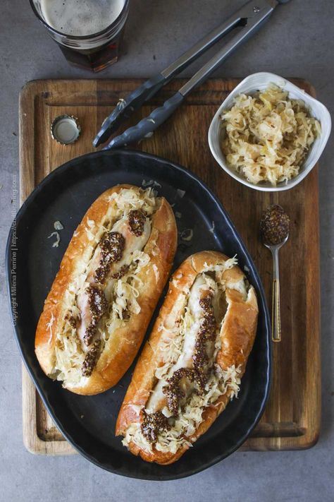 Beer Braised Sauerkraut and Bratwurst | Craft Beering Braised Sauerkraut, Cooking Sauerkraut, German Cusine, Oktoberfest Appetizer, Oktoberfest Menu, Beer Bratwurst, Traditional German Food, Bratwurst Recipes, Fermented Sauerkraut