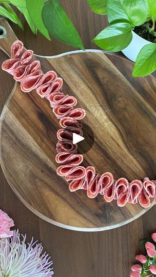 112 reactions · 15 shares | ✨Easy Salami River✨  Steps to create this at home:  1. Fold a slice of salami in half and then in half again  2. Alternate folds on a toothpick so the larger arch faces outward  3. Add 4 slices to each toothpick and combine to make it as long as you want!  Save this for later and follow along @thegratefulgraze for more easy charcuterie tricks 🤍  #salamiriver #salamistyling #charcuterietutorial #meatandcheese #charcuterieboard #charcuterie #charcuteriebox #grazingtable #cheeseboard #entertainingideas #easyentertaining #cheeseboardsofinstagram #charcuterieboardsofinstagram #cheeseboardgoals #charcuterieplatter #cheeseplate #cheeselover | Julie | Jacksonville Charcuterie | Hotel Pools · Hours Charcuterie Tricks, Salami River, Easy Charcuterie, Charcuterie Inspiration, Charcuterie Platter, Grazing Tables, Easy Entertaining, Cheese Lover, Cheese Platters