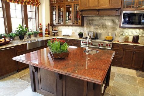 Kitchen with beige granite countertops and high grade red granite island solid wood countertops Red Granite, Decor Ikea, Classic Kitchen, Granite Kitchen, Kitchen Pictures, Elk Lighting, Kitchen Remodel Idea, Wood Kitchen, Fixer Upper