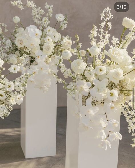 Wedding Flower Arrangements Altar, Alter Flowers For Church, Ceremony Pedestal Arrangements, Clear Plinths With Flowers, Plinths With Flowers, Wedding Pillars Ceremony, Wedding Pillar Decorations, White Altar Arrangements, Bali Wedding Decor