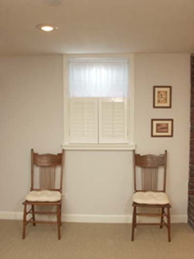 "fake" a bigger window in a basement, use shutters below small window and frame it out like the window is larger Basement Window Treatments, Basement Remodeling Before And After, Basement Window, Small Basement Remodel, Basement Furniture, Sunken Living Room, Basement Windows, Small Basement, Basement Apartment