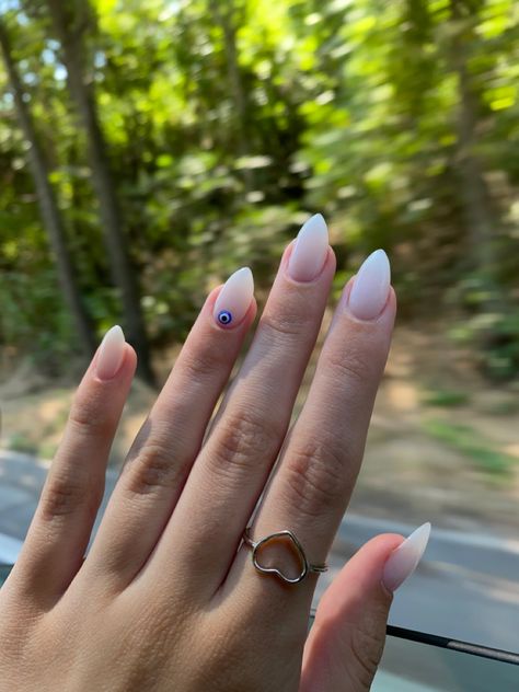 Summer Nails 2023 Milky White, White Nails Evil Eye Design, Almond Nails Designs Milky White, Milky White Nails Evil Eye, Blue Eye Nail Design, The Evil Eye Nails, Nails With Greek Eye, Evil Eye Accent Nail, Milky White Almond Nail Ideas