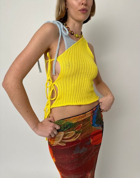 Asymmetric knit top with ties at the side Yellow cotton with blue brushed mohair tie 3 adjustable ties at the side Knitted in London Model is 5ft 7, a size U.K 8 and wears size S Made-to-order item with a 10 day production time. Brushed Mohair, Summer Knits, London Models, Knitwear Dress, Tie Top, Coat Dress, Knit Top, Crochet Top, In London