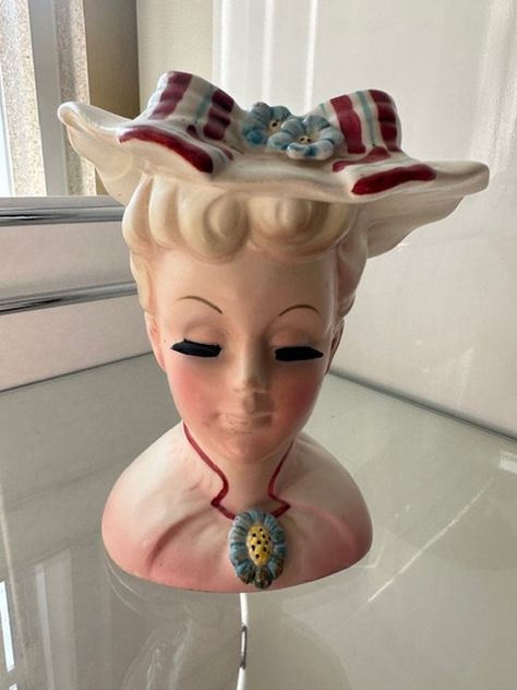 1950's Lefton China Lady Head Vase #2358 Blonde Lady with Pink Dress and Brooch Hat with Bow and Flowers. Vase is in excellent condition with no chips or cracks. There is a tiny bit of discoloration but considering it's age, it's in great condition. Vase is 6" tall. Rare find! Head Vases, Hat With Bow, Lefton China, Face Vase, Flowers Vase, Vintage Lady, Head Vase, Maize, 50s Fashion