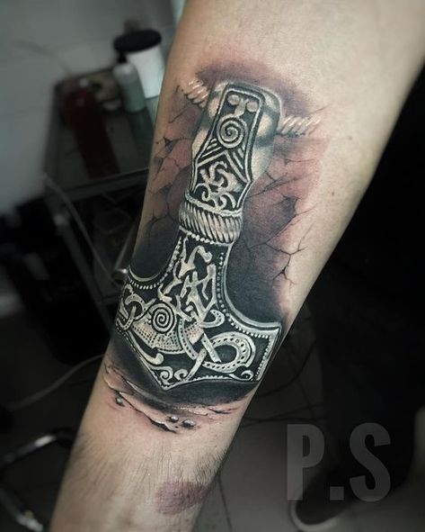 Hilt of a sword tattooed on the arm done by @platon_tattoo_ | www.otziapp.com Thors Hammer Tattoo, Thor Hammer Tattoo, Mjolnir Tattoo, Tattoos Celtic, Thor Tattoo, Hammer Tattoo, Scandinavian Tattoo, Armor Tattoo, Buddha Tattoos