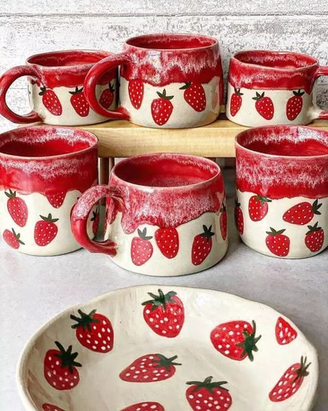 Love in Pottery on Instagram: "lovely ceramic strawberry 🍓 mug and plate by @artesano_ceramika ! 🙈😘💚 FOLLOW👉 @loveinpottery for more pottery contents ☕️ ! Credit 📷💚 @artesano_ceramika visit their page and support 💕 Follow us on @mustvisitguide (Travel Lovers), @dailyartlist (Art Lovers) & @musthomeguide (Interior Lovers) ! #ceramique #potterylove #instapottery #interiordesign #craft #art #ceramicartist #artist #stoneware #contemporaryceramics #ceramicsculpture #ceramica #homedecor #ceram Hand Painted Pottery Strawberries, Hand Painted Pottery Fruit, Fruit Pottery Painting Ideas, Spring Pottery Painting Ideas, Fruit Pottery Painting, Ceramic Cup Painting Ideas, Clay Trinkets, Ceramic Strawberry, Strawberry Mug