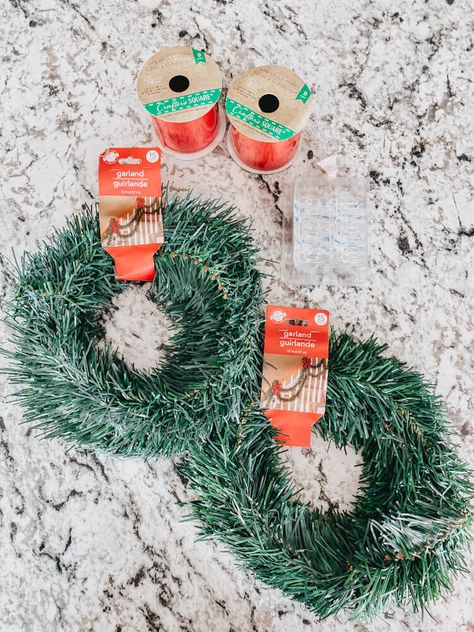 Elevate your kitchen Christmas decor with these DIY cabinet wreaths from Dollar Tree! Hanging cabinet wreaths is easy, cheap, and looks amazing during the holiday. This is Christmas decorating on a budget! Cabinet Christmas Wreaths Diy, Outdoor Christmas Decor On A Budget, Kitchen Cabinet Wreaths Christmas Diy, Christmas Cupboard Decor, Diy Mini Wreath Christmas, Diy Cabinet Wreath, Wreaths For Cabinet Doors, Cabinet Christmas Wreaths, Diy Christmas Cabinet Decor