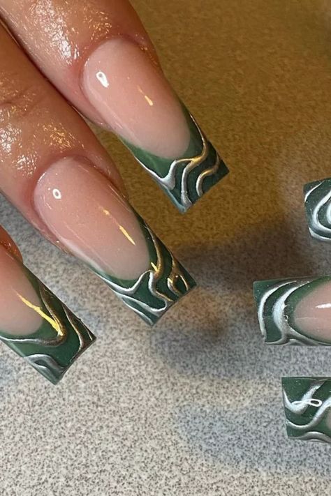 44+ The Epitome of Classy: The Enchanting World of Emerald Green Nails! Green Squared Acrylics, Square Emerald Green Nails, Prom Nails Emerald Green And Silver, Dark Green Prom Nails Short, Emerald Green And Gold Almond Nails, Almond Emerald Green Nails, Prom Nails Short Square, Nail Inspo Emerald Green, Graduation Nails Green