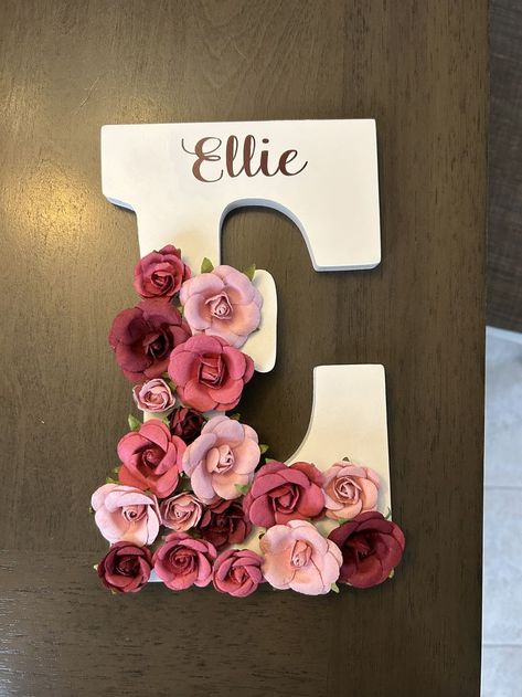 A personalized letter in a color of your choosing with name written in cursive across in vinyl and flowers of any kind and color on the left half of the letter Diy Letter Decor Initials Craft Ideas, Diy Letter Decor Initials, Diy Letter Decor, Initial Crafts, Painted Wood Letters, Stand Up Straight, Nursery Decor Wall, Pink Flowers Wallpaper, Letter Decor