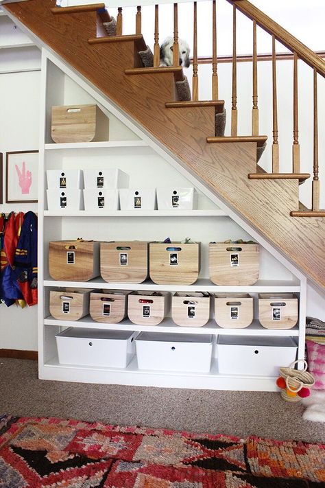 I used Ikea Kuggis large and small boxes, as well as large and small versions of these wood and fabric bins from Target. #ToyStorage #MinimalStorage #UnderstairStorage #StaircaseStorage #ModernStorage Diy Skateboard Art, Ikea Kuggis, Understair Storage, Craft Closet Organization, Painted Fireplace, Diy Skateboard, Peg Wall, Staircase Storage, Diy Side Table