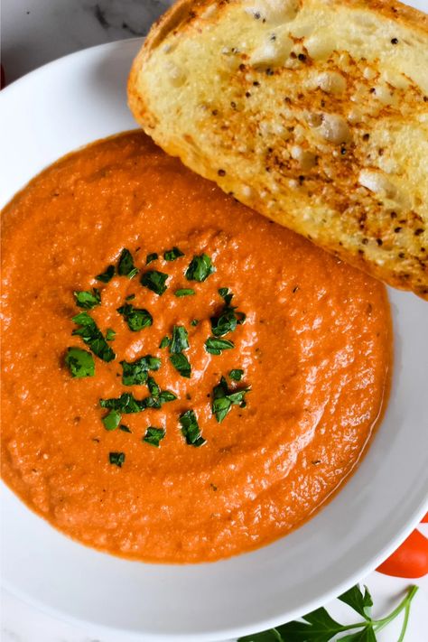 An easy, creamy, dairy-free roasted garlic tomato soup that is sure to warm you up this winter. Roasted Garlic Tomato Soup, Garlic Tomato Soup, Dairy Free Tomato Soup, Vegan Tomato Soup, Miso Paste, Tomato Soup Recipes, Tomato Soup, Roasted Garlic, Dairy Free Recipes