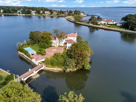 For $4.9M, own a private New York island with a 100-year-old Mediterranean-style mansion | 6sqft Garage Pool House, New Rochelle New York, New York Mansion, House On The Water, Mega Mansions, New Rochelle, Circular Driveway, Old Houses For Sale, Oak Island