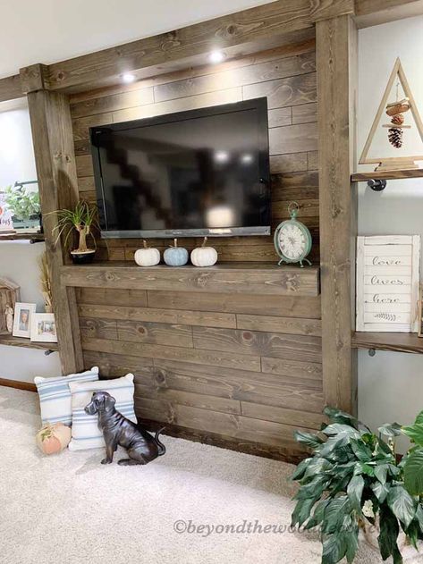 DIY TV Center and Living Room - Beyond the Wood decorating on a budget Tv Area Living Room, Decorating Tv Cabinets Living Rooms, Farmhouse Tv, Diy Entertainment Wall Ideas, Rustic Tv Accent Wall, Tv Wall Design Basement, Easy Diy Tv Wall Ideas, Cabin Tv Wall Ideas, Rustic Accent Walls In Living Room