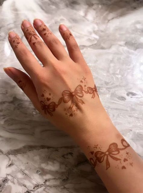 stylish henna, modern henna, Modern henna designs, Modern henna for hands, modern henna designs simple, Modern henna for beginners, modern mehndi design back hand, modern henna designs front hand, simple henna designs, eid henna designs, arabic henna designs, simple mehndi design, new mehndi design, henna designs for eid Bow Mehndi, Bow Henna Design, Modern Henna Designs Front Hand, Arabic Henna Designs Simple, Eid Henna Designs Arabic, Bow Henna, Henna For Hands, Henna Designs Arabic, Henna Modern