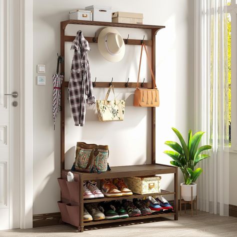 Transform your entryway with AMBIRD's versatile hall tree! Crafted with a sturdy bamboo frame, it's a 6-in-1 marvel: a shoe bench, coat rack, and storage bench all rolled into one. With 14 coat hooks and a handy cloth bag, it's designed to keep your space tidy and welcoming. Its large size ensures ample storage, while the warm brown finish complements any decor. Perfect for those who love organized elegance. #EntrywayEssential #OrganizedLiving Shoe Storage Shelves, Bench With Coat Rack, Coat Rack Shoe Bench, Shoe Bench Entryway, Bench Entryway, Shoe Rack Bench, Shoe Storage Shelf, Shoe Shelves, Entryway Shoe