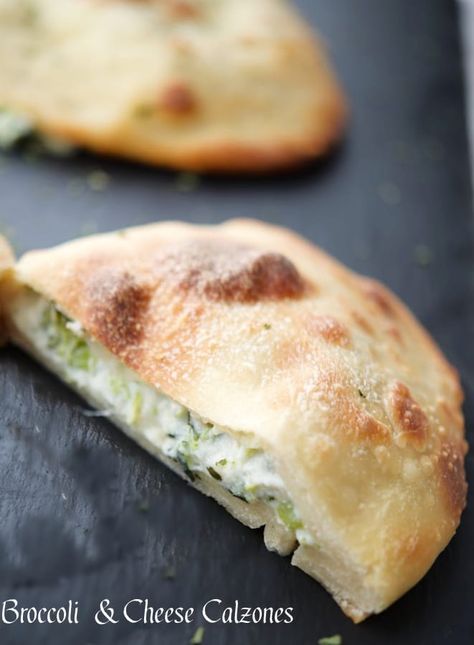 broccoli and cheese calzone cut in half on a gray tile Broccoli And Cheese Calzone, Brocoli And Cheese, Cheese Calzone, Calzone Recipe, Egg Pan, Gray Tile, Flour Alternatives, Eggplant Parmesan, Frozen Broccoli