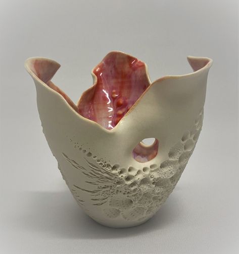 Ceramic Vase - The graceful dance of underwater plants is captured in the gently curled petals of this wheel-thrown porcelain vase. The interior is covered with a luscious shade of coral pink, and the exterior is impressed with plants, coral, and shells to create an organic, oceanic texture.<br><br>As each is created individually, there will be slight variances in the texture and shape. Pinch And Coil Ceramics, Organic Shape Sculpture, Ceramic Vessel Shapes, Organic Ceramic Vase, Pinch Pot Designs, Coil Pots Ideas, Oyster Ceramic, Ceramics Vessels, Coral Vase